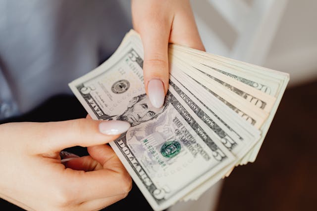 person counting money